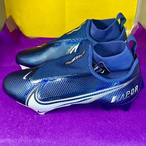 white and blue nike cleats